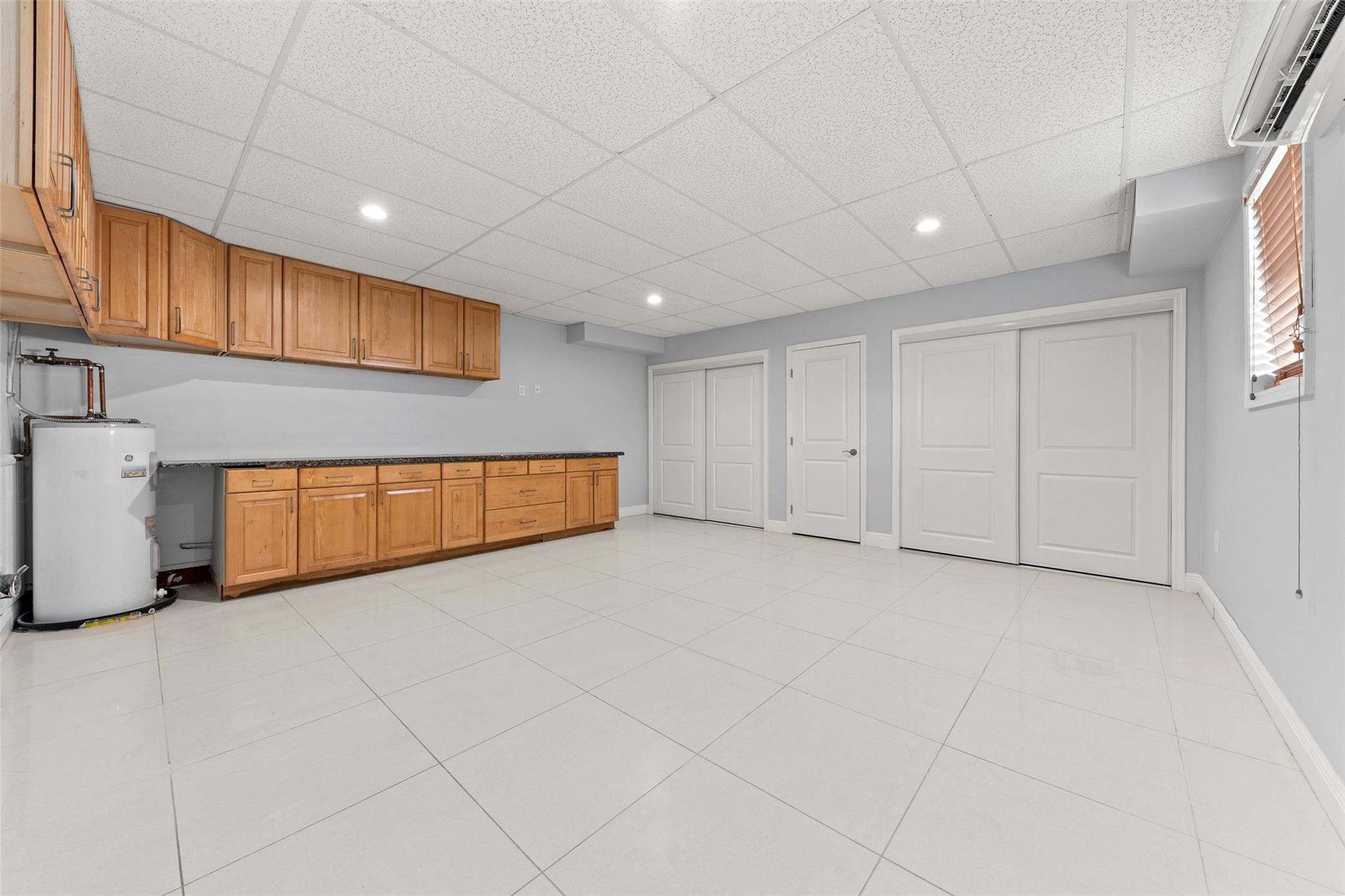 9918 Moss Pond Drive Boca Raton, FL 33496 - Photo 23 of 31 a view of an empty room with wooden floor