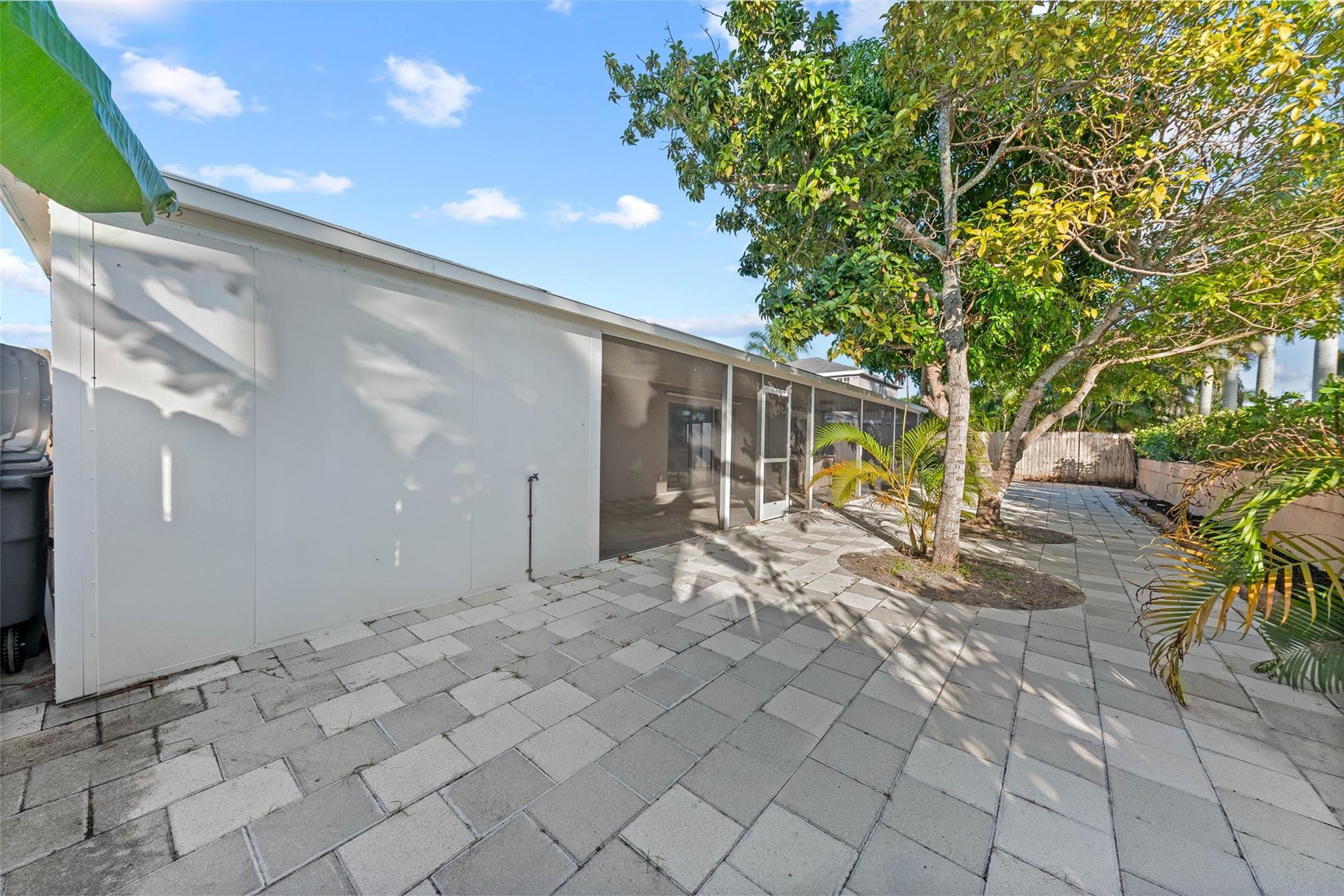 9918 Moss Pond Drive Boca Raton, FL 33496 - Photo 28 of 31 a view of a house with backyard and sitting area