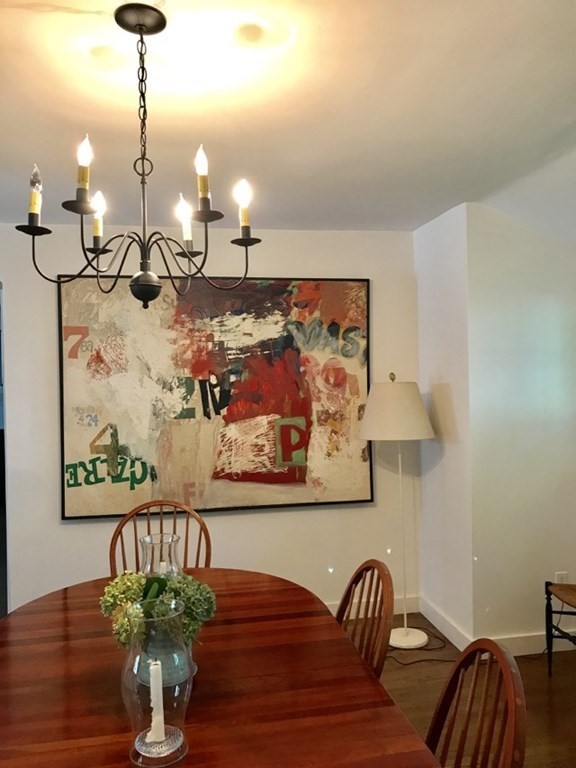 21 William Street Tisbury, MA 02568 - Photo 12 of 27 a dining room with furniture and wooden floor