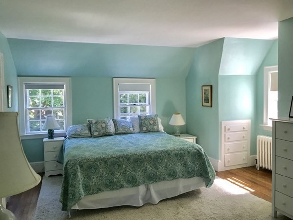 21 William Street Tisbury, MA 02568 - Photo 20 of 27 a bedroom with a bed and a dresser