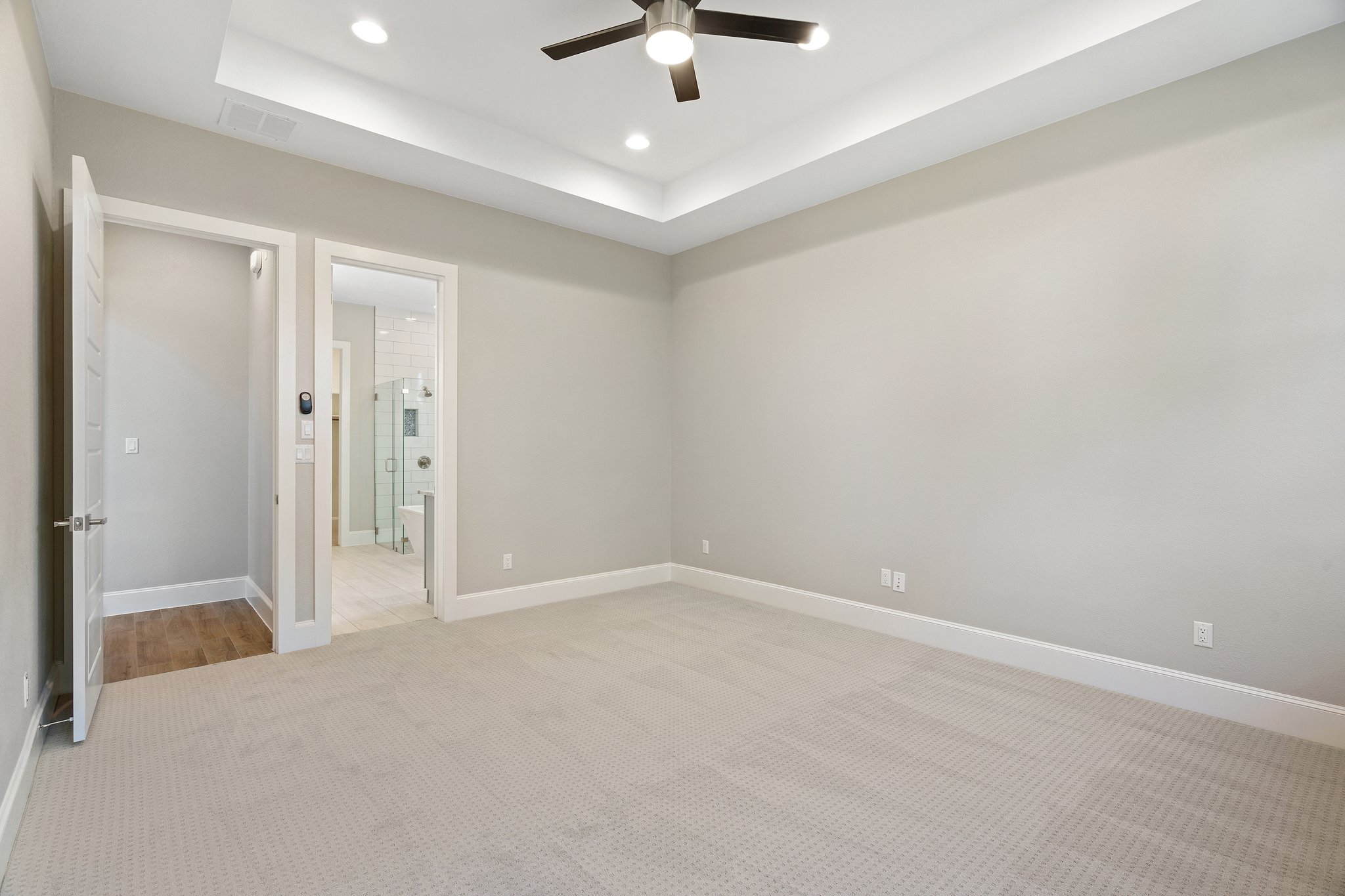 112 Axis Loop Georgetown, TX 78628 - Photo 21 of 39 an empty room with a ceiling fan and glass door