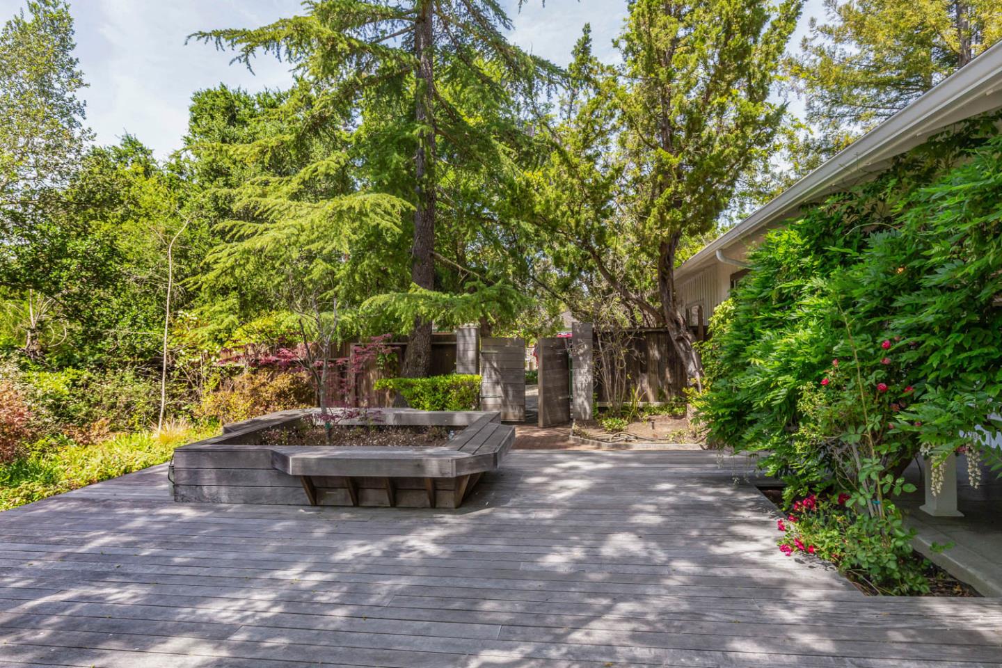 136 Bardet Road Woodside, CA 94062 - Photo 3 of 13 a view of a backyard with sitting area
