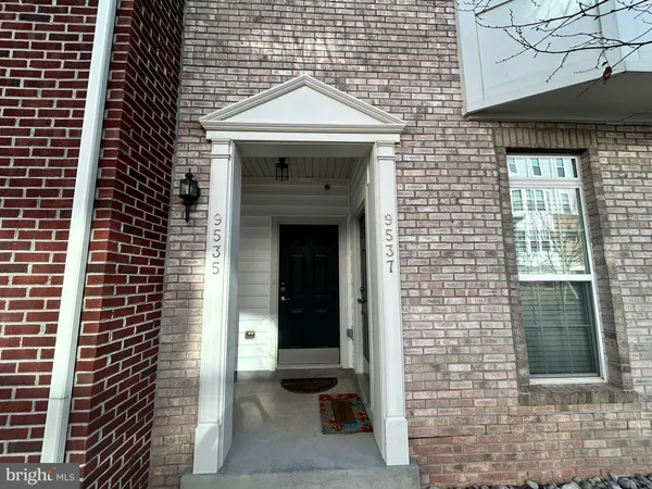 a front view of a house with a door