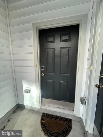 a bathroom with a toilet and shower