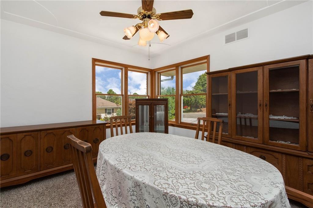 1099 Ridge Road Ambridge, PA 15003 - Photo 8 of 19 Nice sized dining room with corner windows.