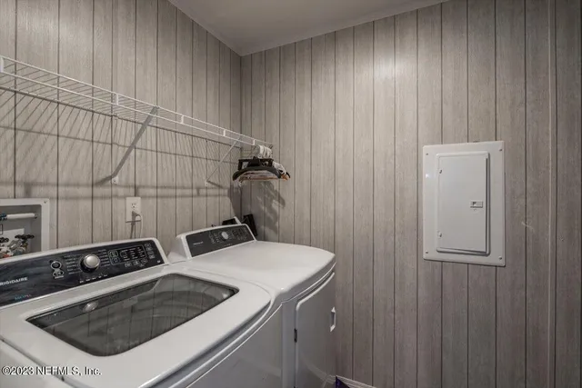 a utility room with dryer and washer