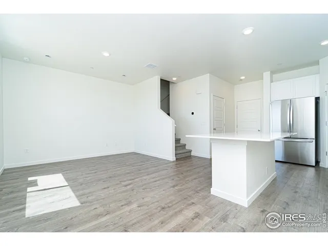 a bathroom with a toilet a sink and a mirror