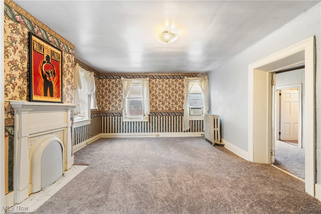5147 Bluebird Road Northwest Malvern, OH 44644 - Photo 21 of 26 Bedroom with fireplace
