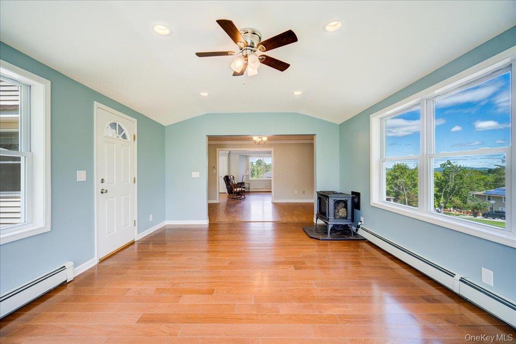 11 Catskill Avenue Monroe, NY 10950 - Photo 12 of 48 Great room with door leading to patio and backyard.