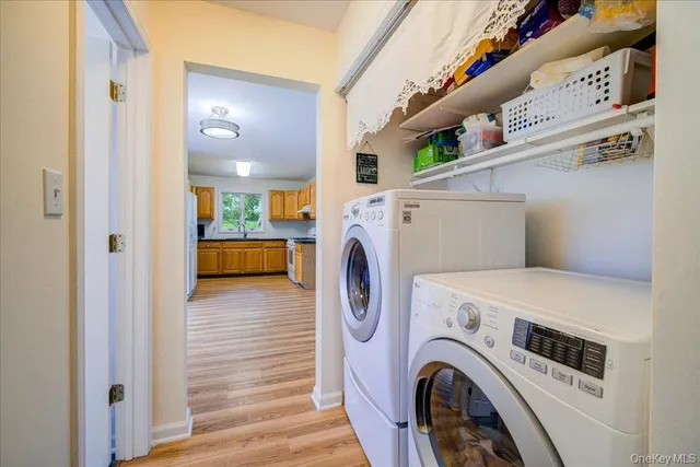 a utility room with dryer and washer