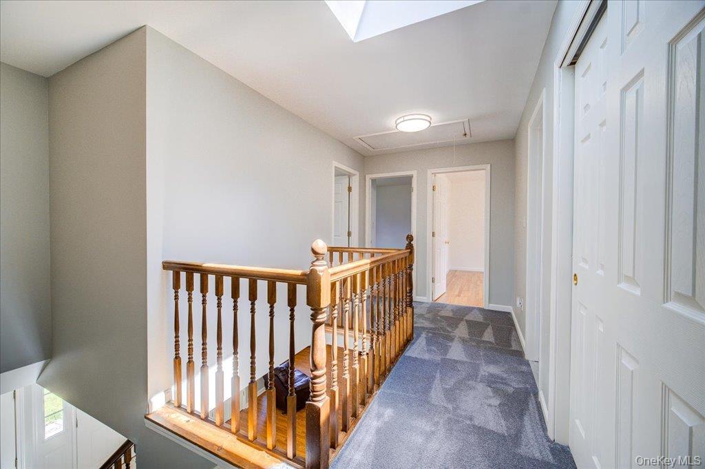 11 Catskill Avenue Monroe, NY 10950 - Photo 27 of 48 Hall with an upstairs landing, attic access, and carpeted floors,