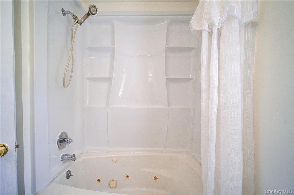 11 Catskill Avenue Monroe, NY 10950 - Photo 34 of 48 Bathroom featuring a combined bath / shower with jetted tub