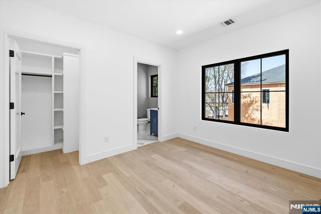 150 Howland Avenue River Edge, NJ 07661 - Photo 24 of 45 a view of an empty room with a window