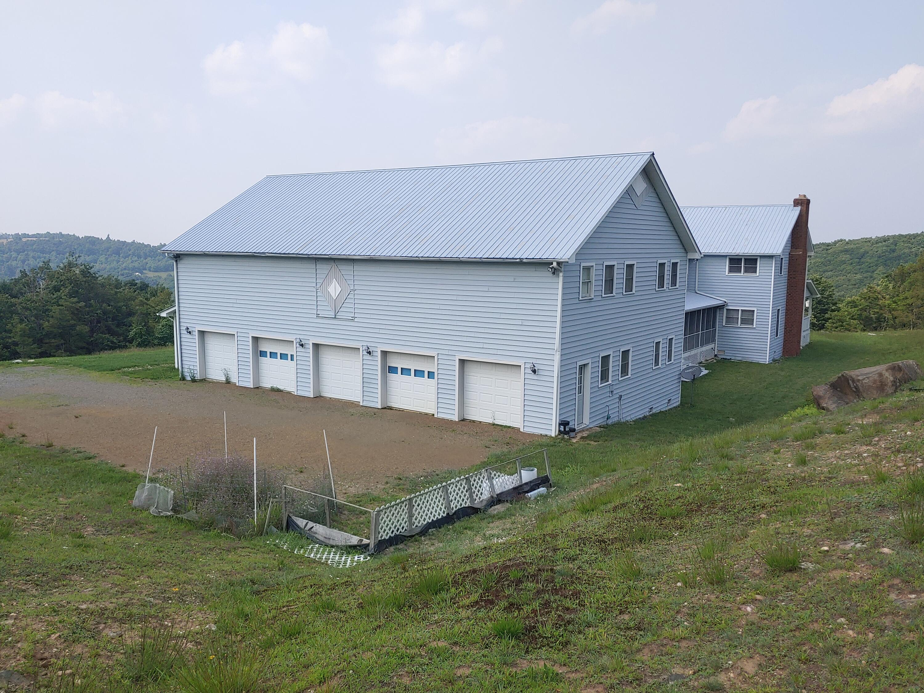 136 Old Fields Road Southwest Floyd, VA 24091 - Photo 3 of 71 a aerial view of a house next to a big yard