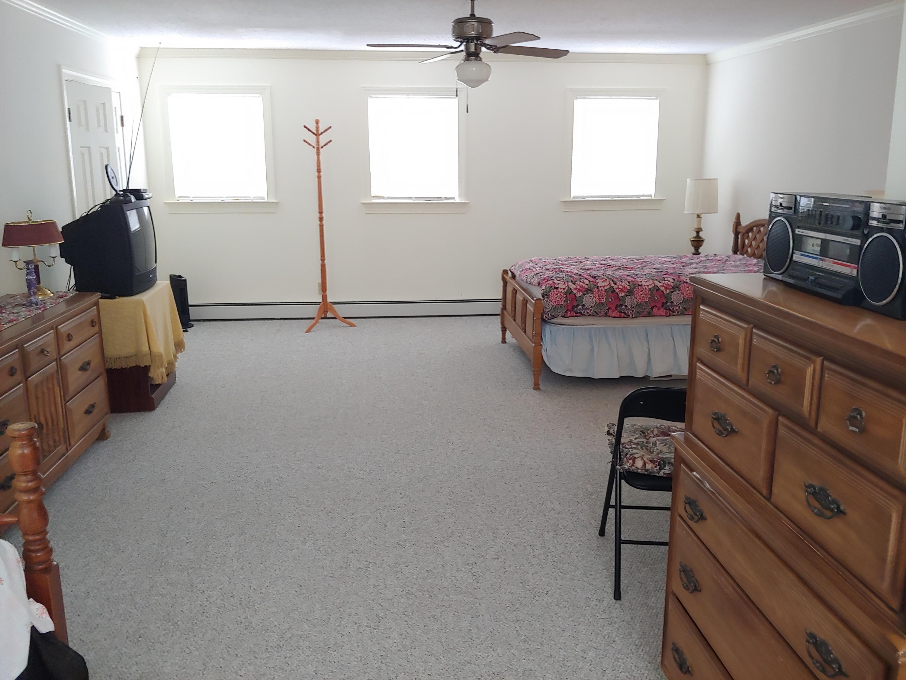 136 Old Fields Road Southwest Floyd, VA 24091 - Photo 27 of 71 a bedroom with furniture and a window