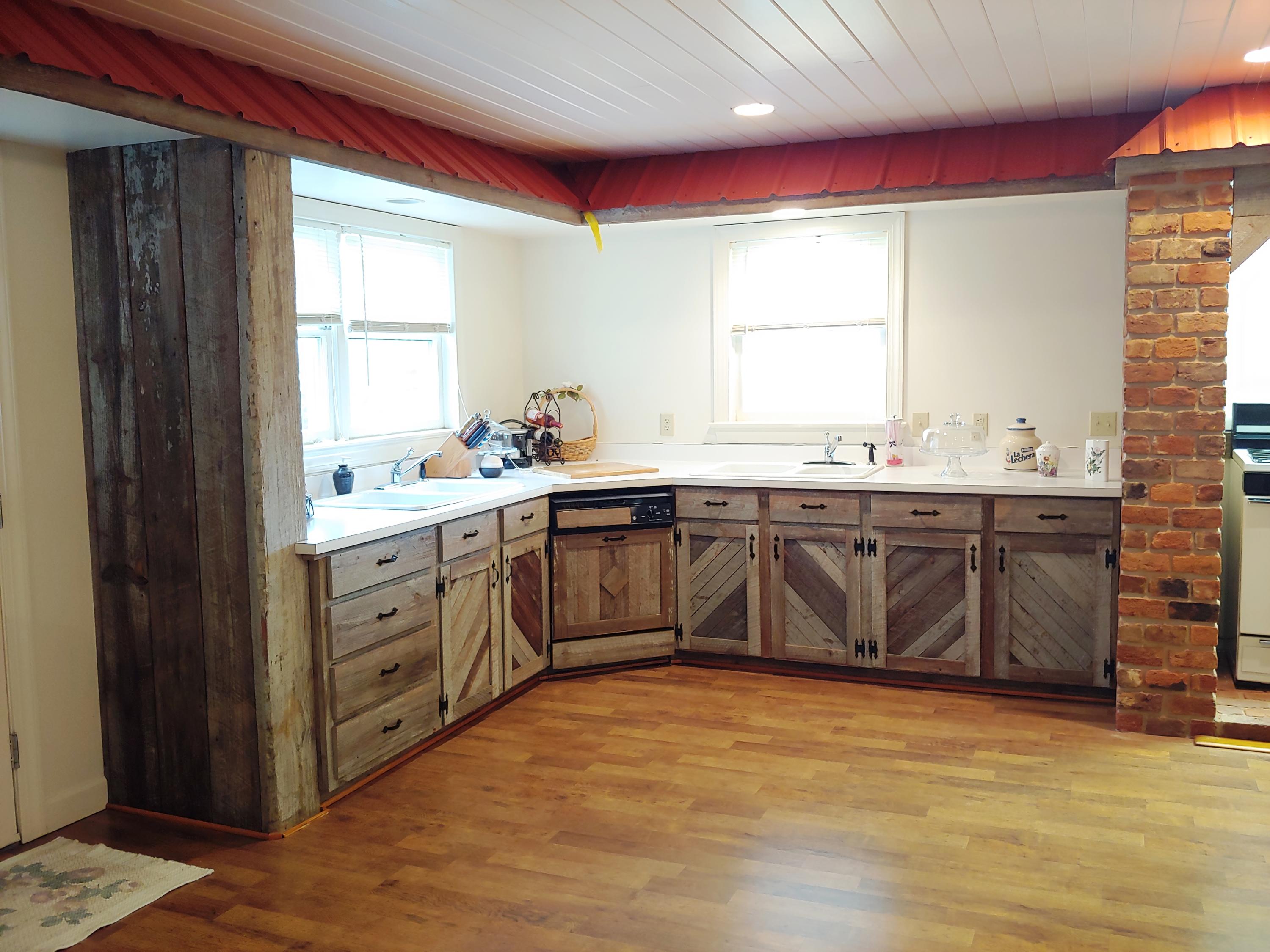 136 Old Fields Road Southwest Floyd, VA 24091 - Photo 32 of 71 a spacious bathroom with a sink double vanity and a window