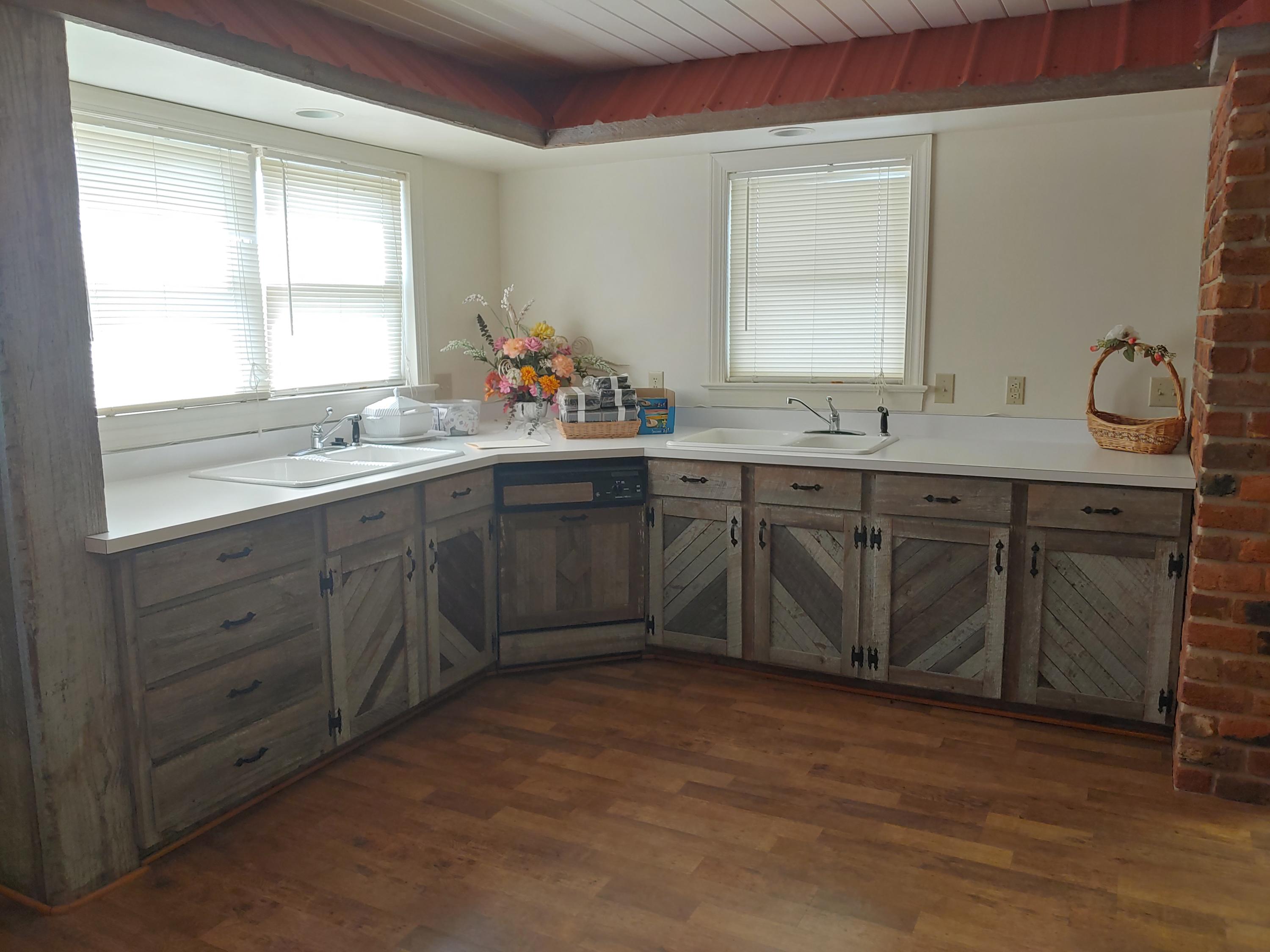 136 Old Fields Road Southwest Floyd, VA 24091 - Photo 39 of 71 a spacious bathroom with a granite countertop sink and a mirror