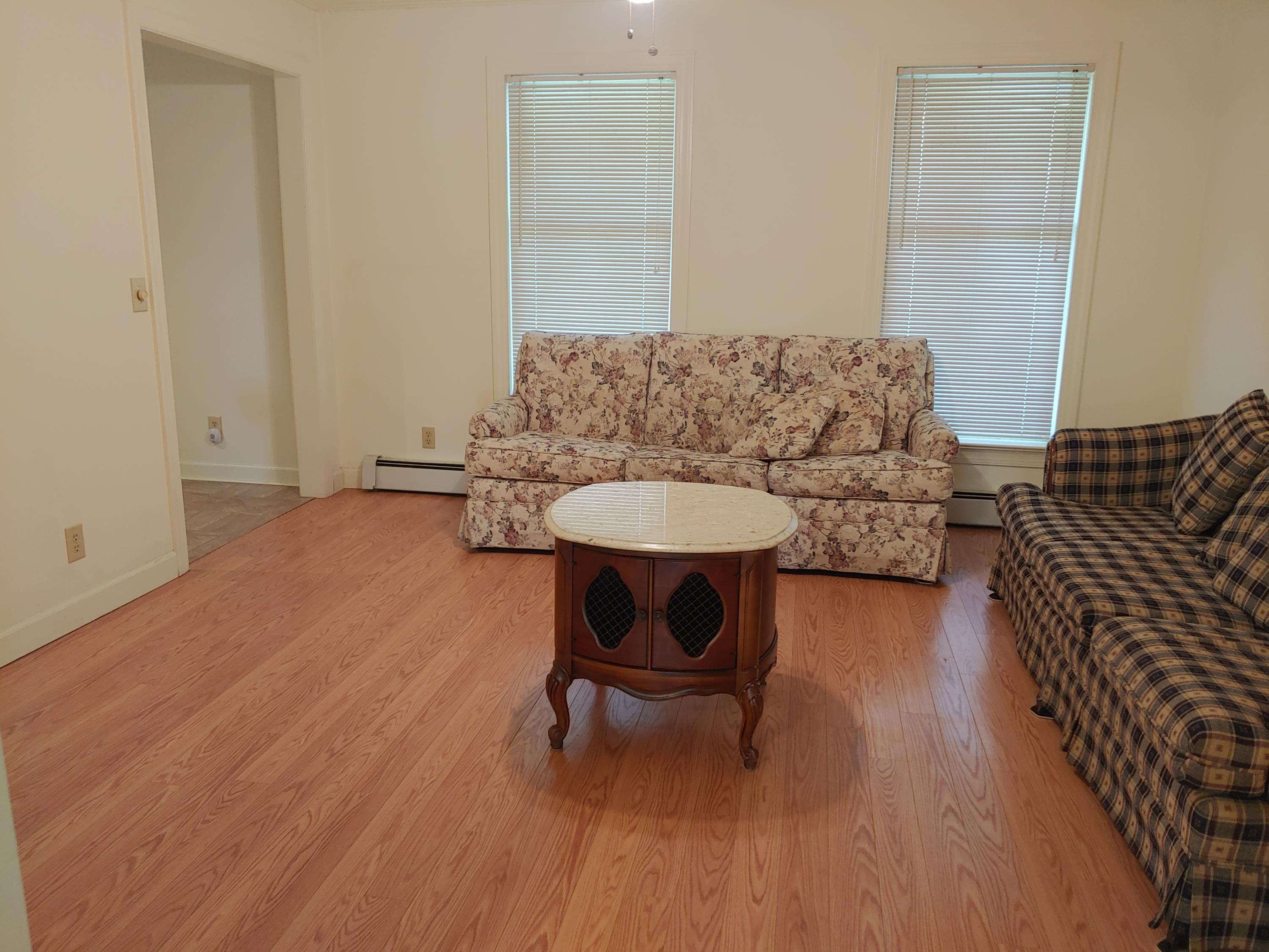 136 Old Fields Road Southwest Floyd, VA 24091 - Photo 44 of 71 a living room with furniture and a wooden floor