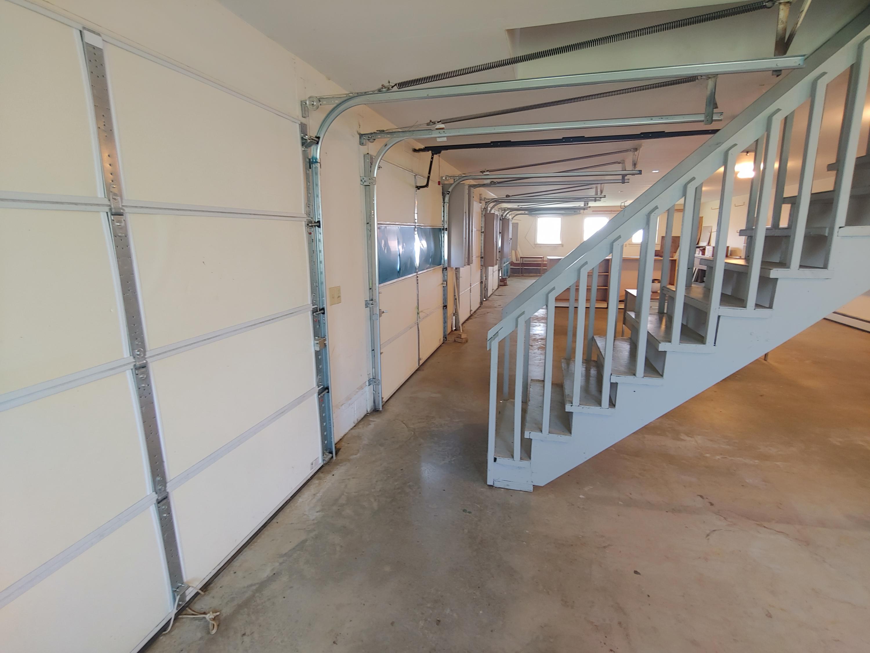 136 Old Fields Road Southwest Floyd, VA 24091 - Photo 60 of 71 a view of staircase with lots of frames on wall
