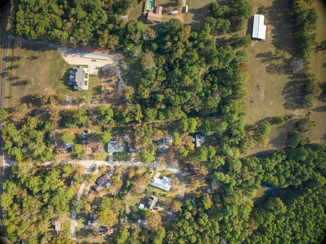 a view of a lake with a building in the background