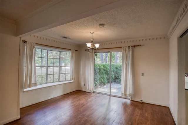 a bathroom with a sink a mirror and a shower