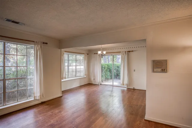 a view of an empty room and window