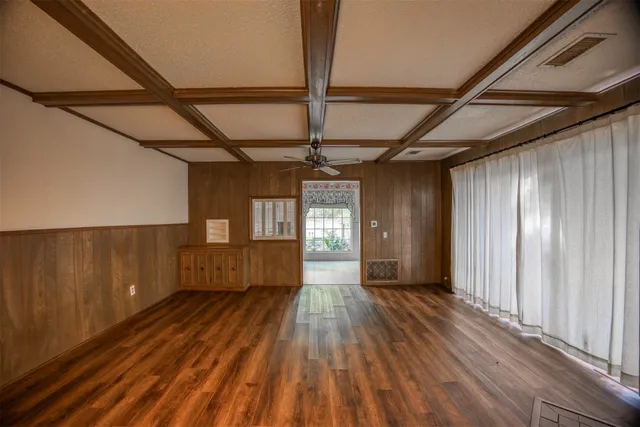 a bathroom with a toilet sink shower and mirror