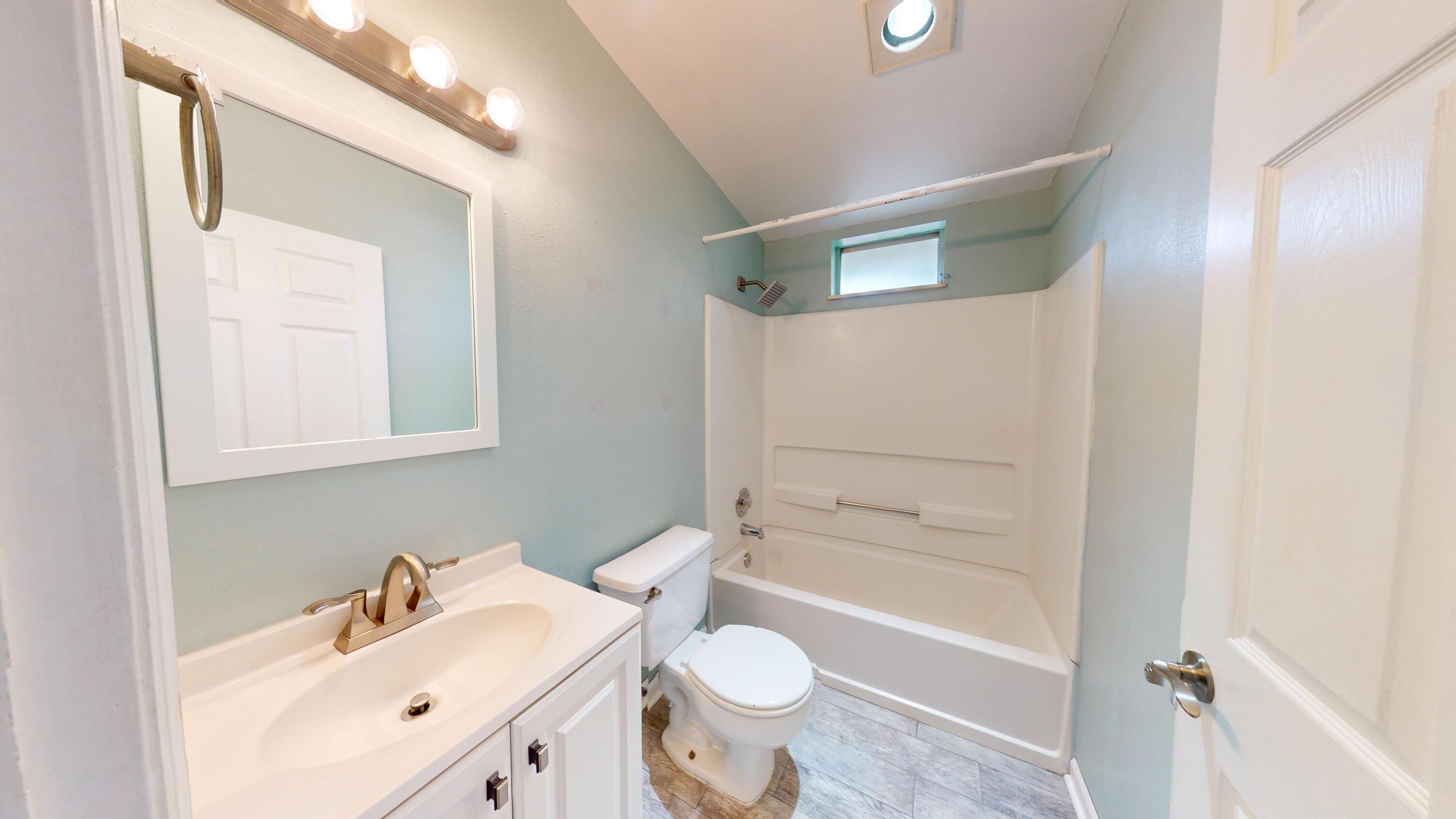31163 Ave H Big Pine Key, FL 33043 - Photo 14 of 17 a bathroom with a sink toilet and shower