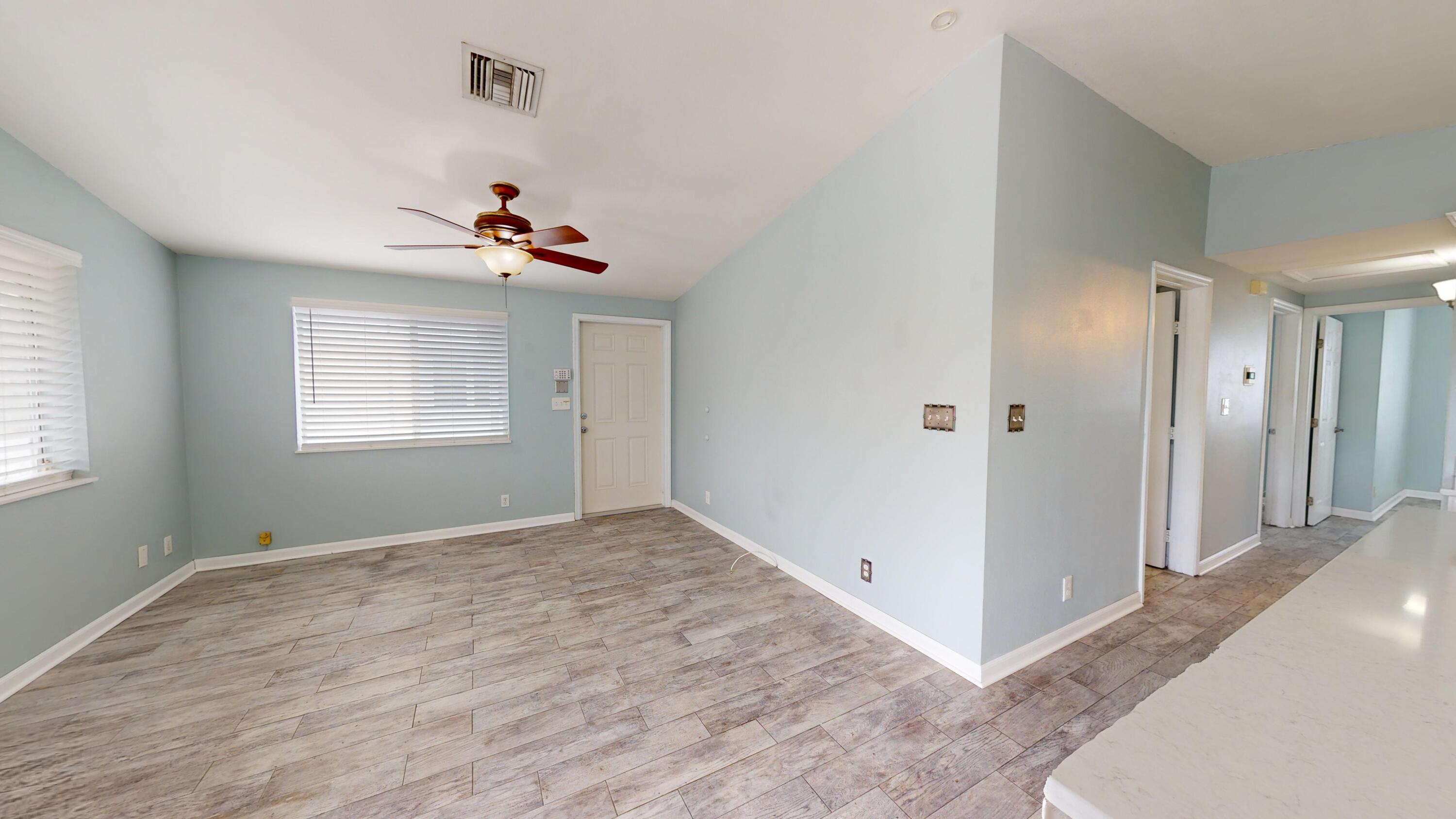 31163 Ave H Big Pine Key, FL 33043 - Photo 7 of 17 a view of an empty room with a window