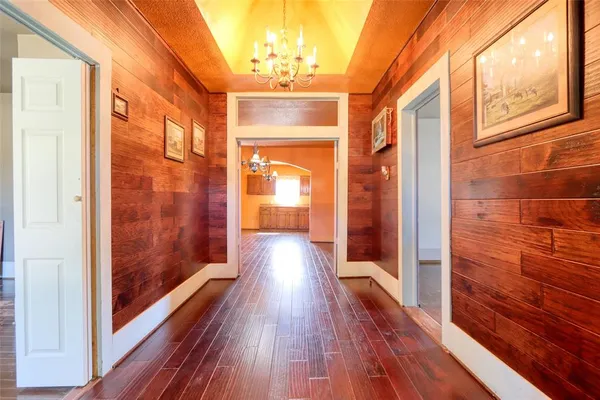 a view of gallery with wooden floor