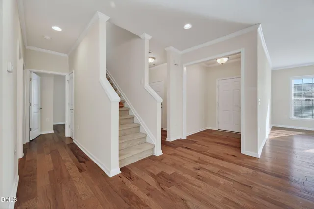 a view of entryway with wooden floor