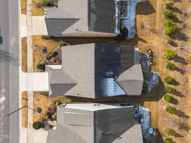 a view of swimming pool with a yard and lake view