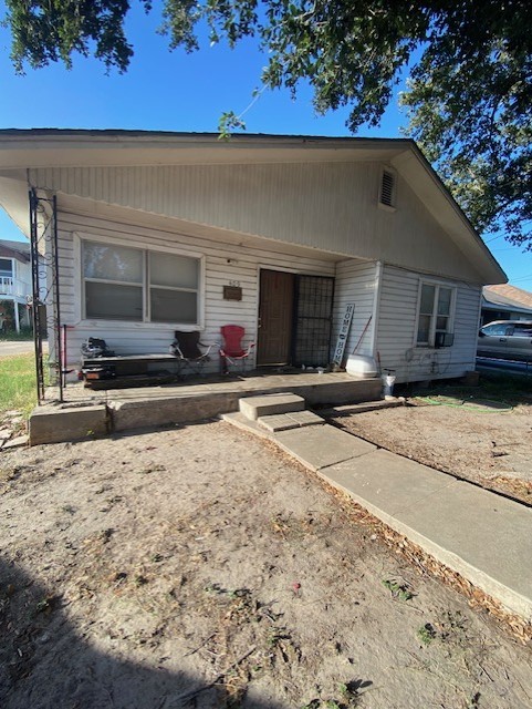 409 Chaparral Street Alice, TX 78332 - Photo 11 of 24 a front view of a house with a yard