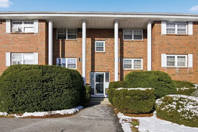 a view of a house with a garden