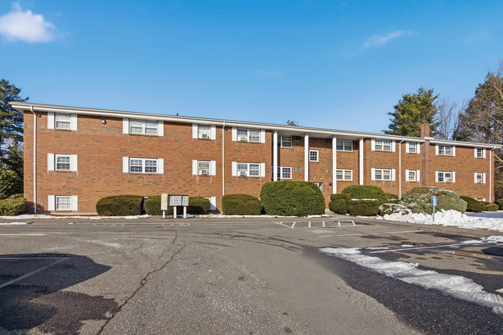 39 Pleasant Street, Unit 7 Northborough, MA 01532 - Photo 22 of 22 a front view of building with a road