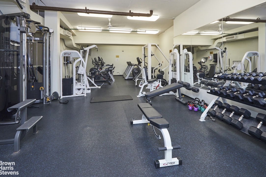 75 East End Avenue, Unit 17A Manhattan, NY 10028 - Photo 11 of 13 a view of a room with gym equipment