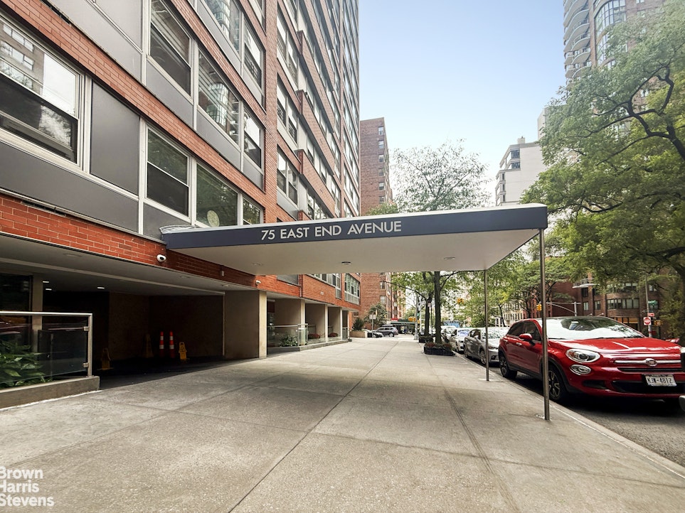 75 East End Avenue, Unit 17A Manhattan, NY 10028 - Photo 12 of 13 a couple of cars parked in front of building