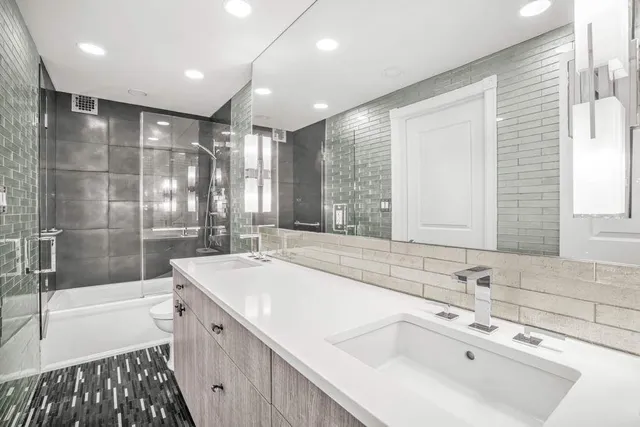 a bathroom with a bathtub and a sink