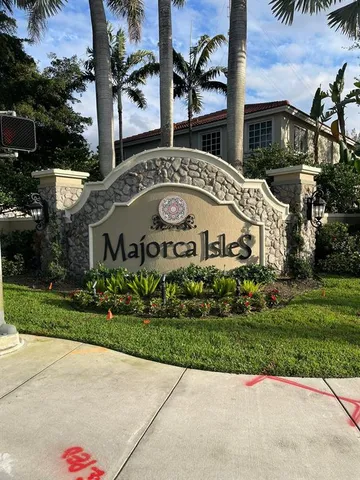 a view of a building with a garden