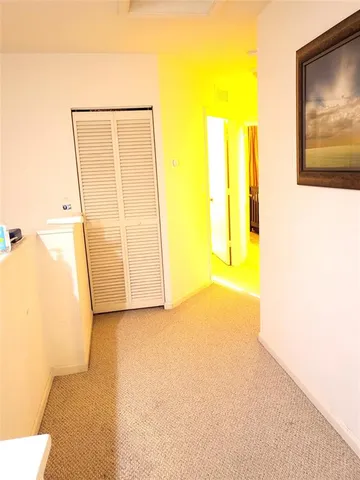 a kitchen with a stove a sink and a refrigerator