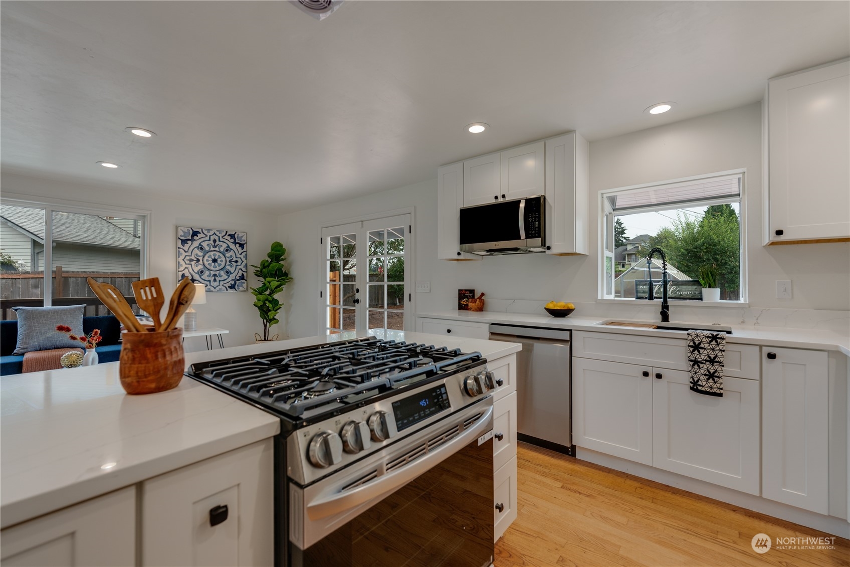 17822 85th Place Northeast Bothell, WA 98011 - Photo 12 of 33 a kitchen with a stove and a white refrigerator