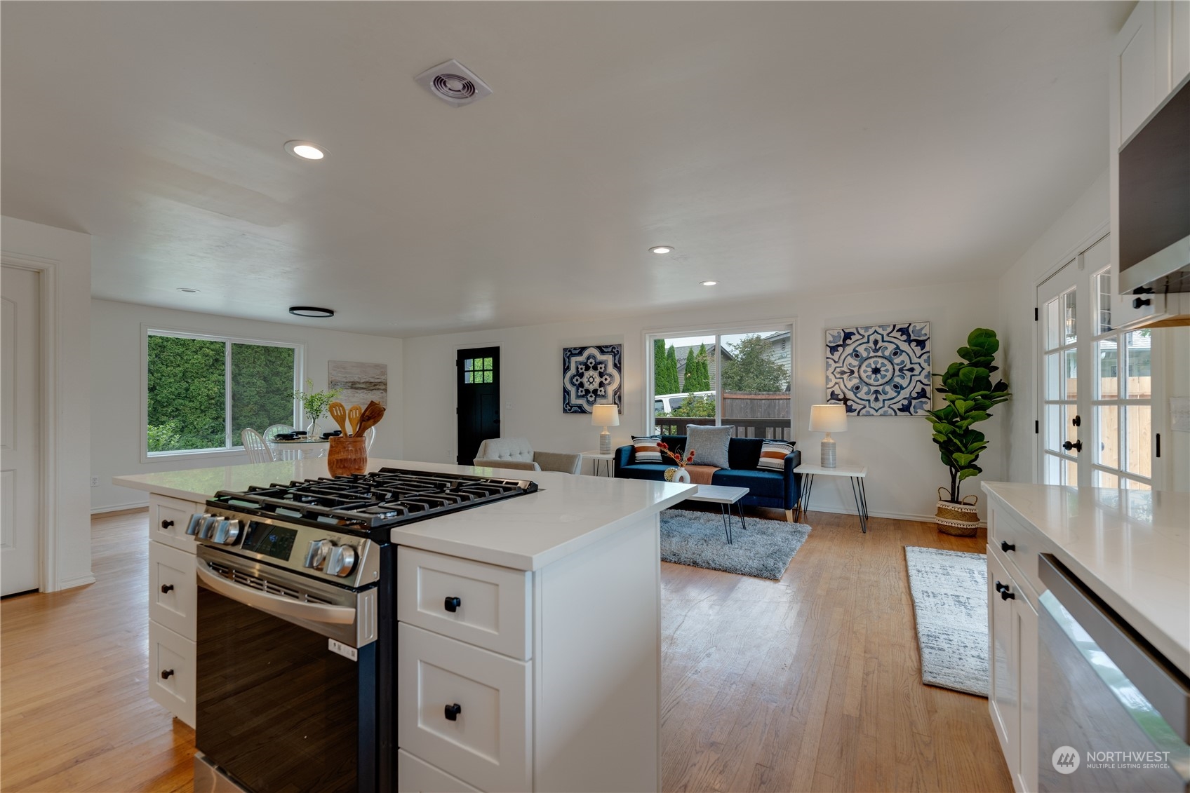 17822 85th Place Northeast Bothell, WA 98011 - Photo 13 of 33 a kitchen with sink stove and wooden floor