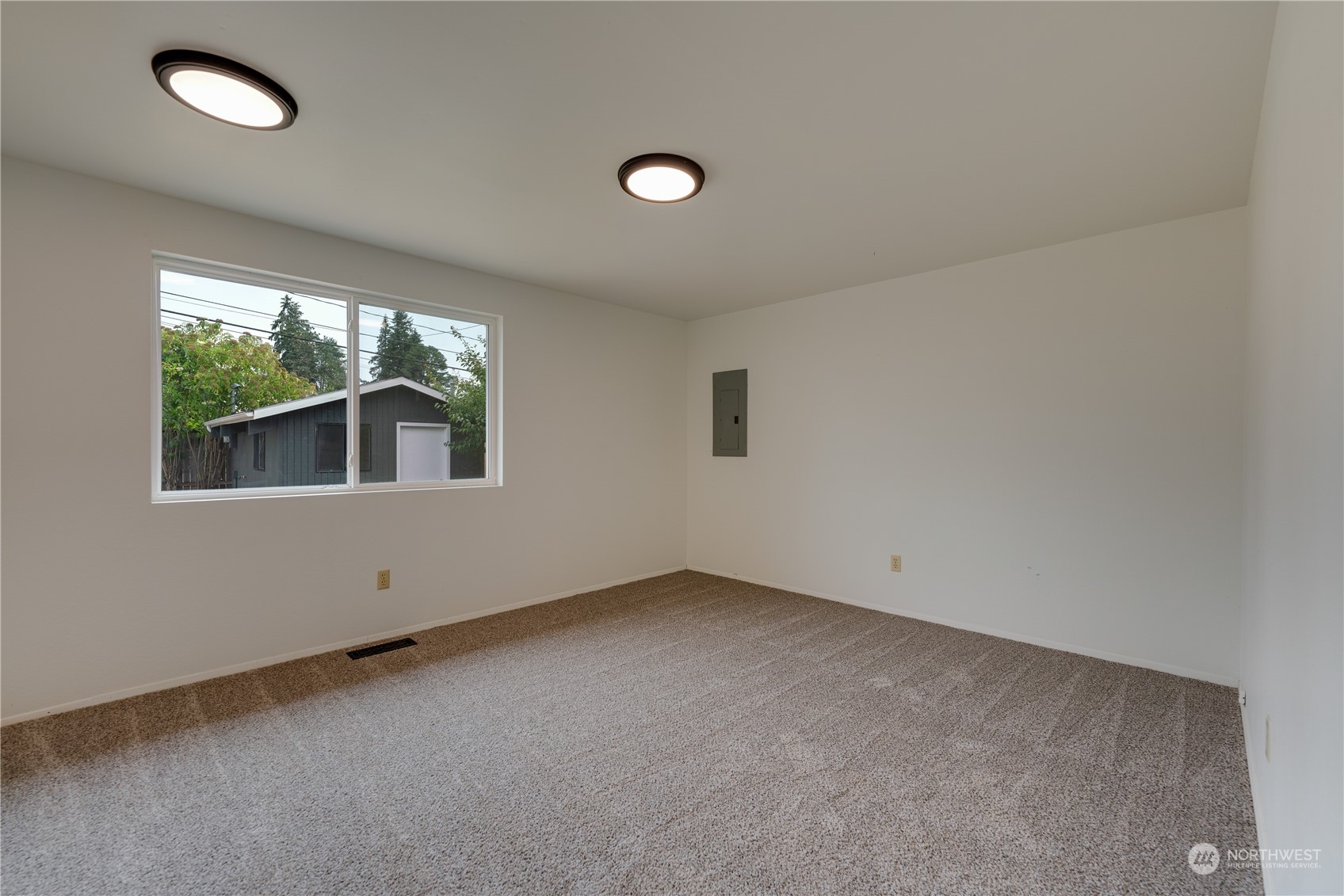 17822 85th Place Northeast Bothell, WA 98011 - Photo 19 of 33 an empty room with large windows
