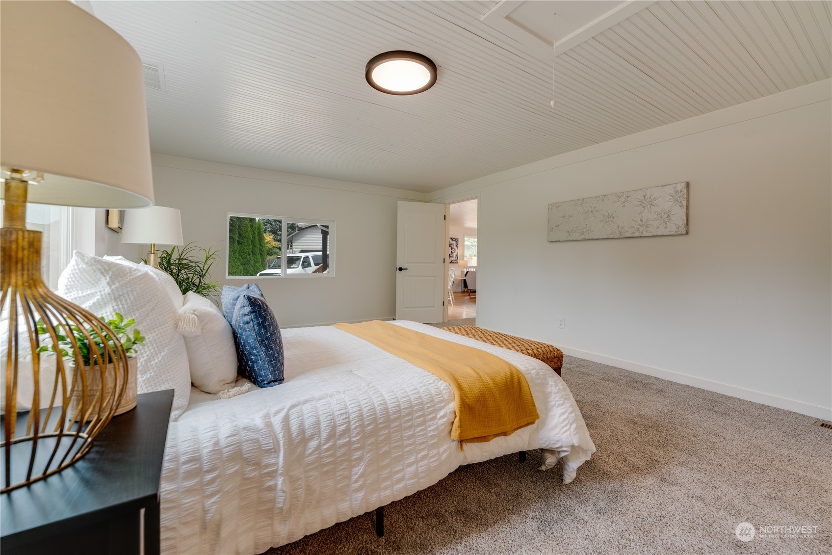 17822 85th Place Northeast Bothell, WA 98011 - Photo 23 of 33 a bedroom with a bed and window