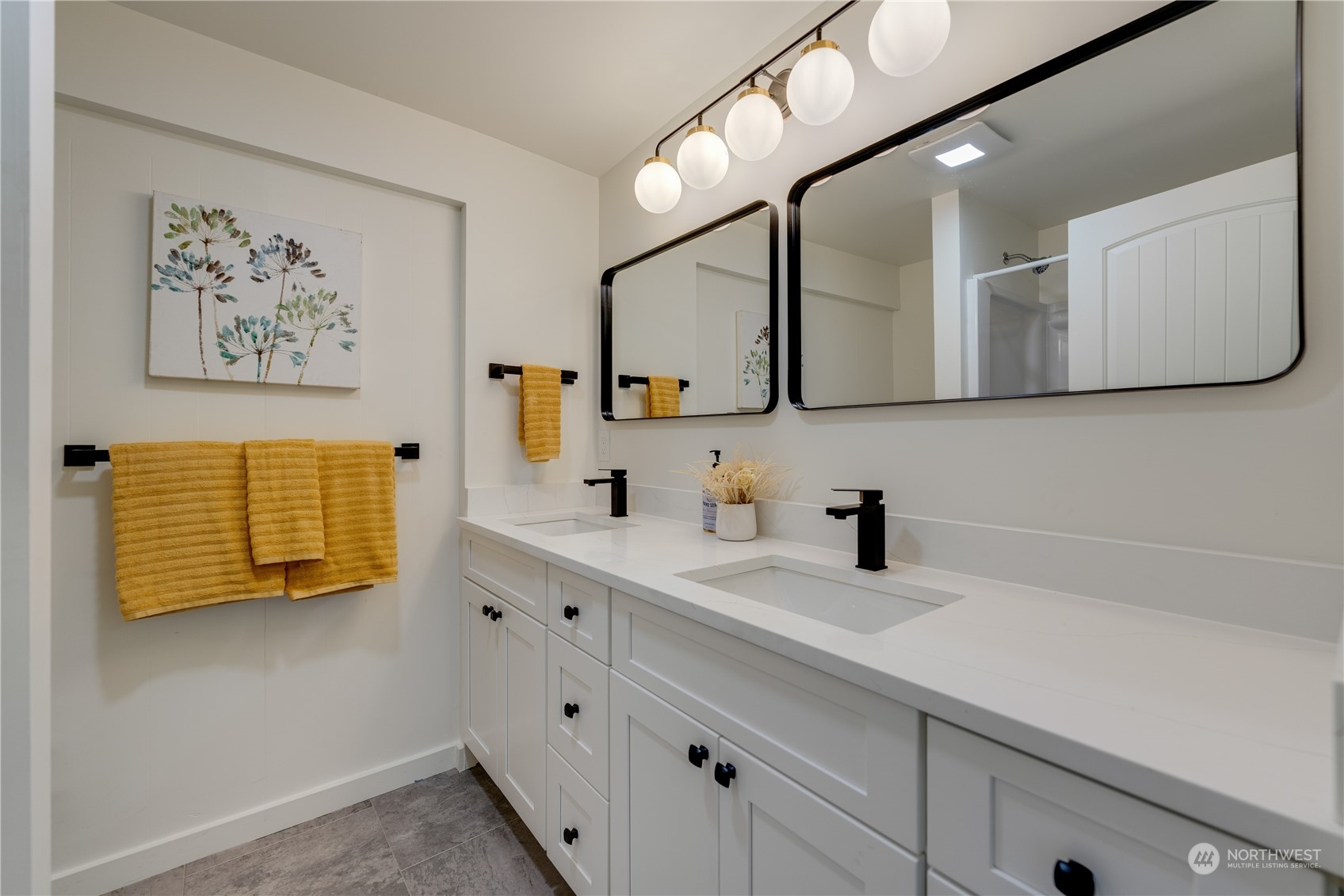 17822 85th Place Northeast Bothell, WA 98011 - Photo 25 of 33 a bathroom with a sink and a mirror