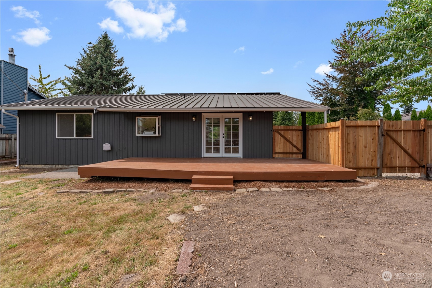 17822 85th Place Northeast Bothell, WA 98011 - Photo 28 of 33 a view of a house with a backyard and a tree
