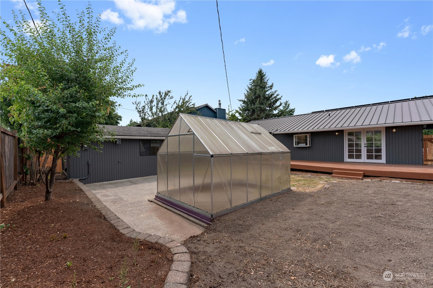 17822 85th Place Northeast Bothell, WA 98011 - Photo 29 of 33 a view of a house with a yard and garage