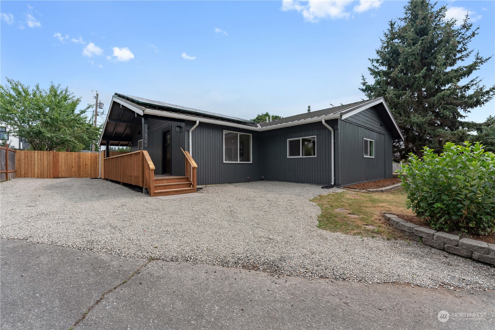 17822 85th Place Northeast Bothell, WA 98011 - Photo 3 of 33 a view of a house with a backyard and garage