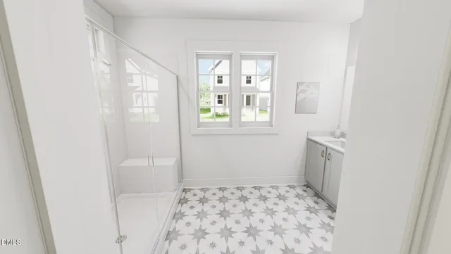 a bathroom with a bathtub and a window