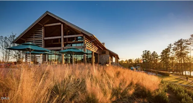 a view of a house with a small yard